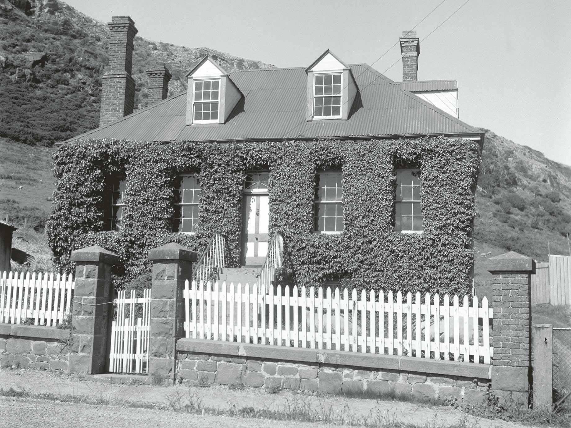 Poet’s Cottage covered in ivy