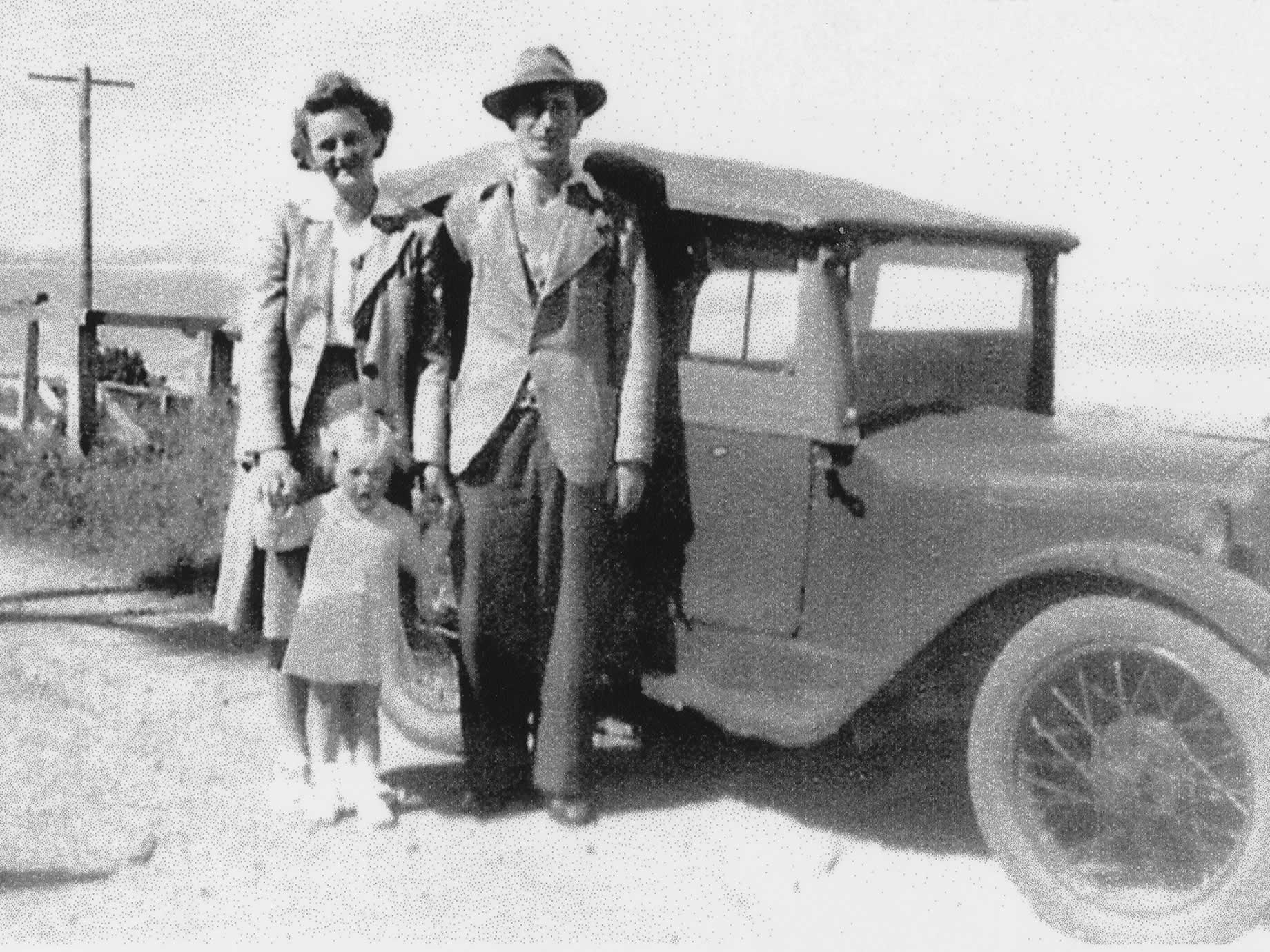 Meg, Bert and Margaret standing with their much loved Austin